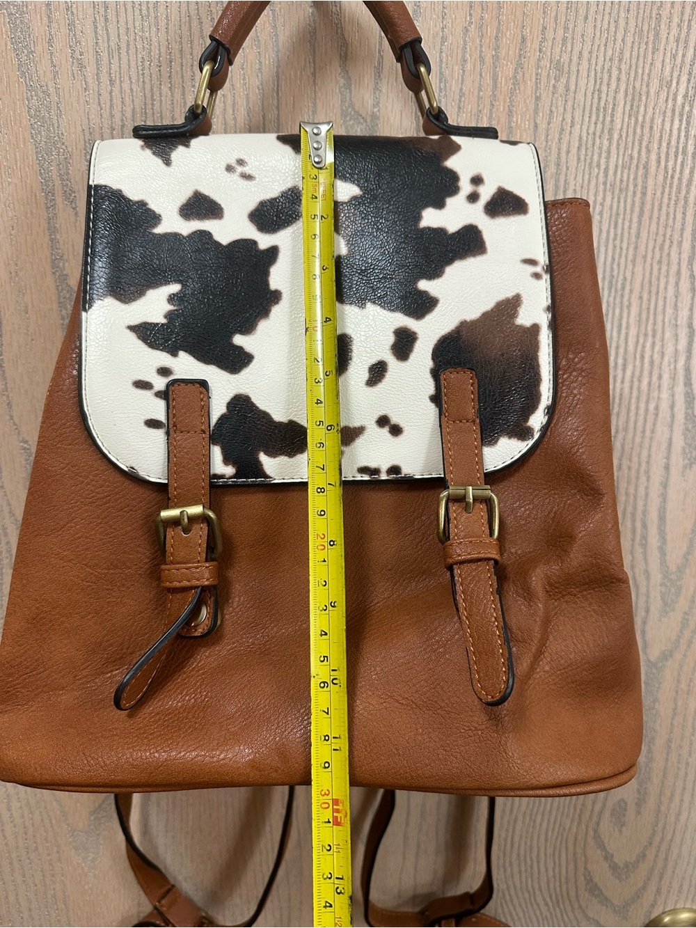 Jen & Co Brooks Convertible Cow Print Faux Leather Backpack - Picture 11 of 12